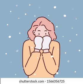 Winter woman in snow looking at camera outside on snowing cold winter day. Hand drawn style vector design illustrations.