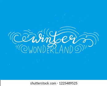 Winter wonderland hand calligraphy. Holiday lettering print. White and blue.