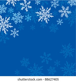 Winter/Christmas background with snowflakes for your design in white and blue colors