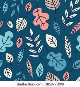 Winter/fall seasonal colorful seamless pattern background with various tree leaves. 