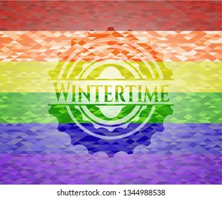 Wintertime emblem on mosaic background with the colors of the LGBT flag