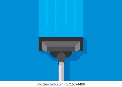 Wiper cleaning blue surface. Could be a window pane, counter top, floor or exterior of a car.