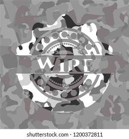 Wire written on a grey camouflage texture