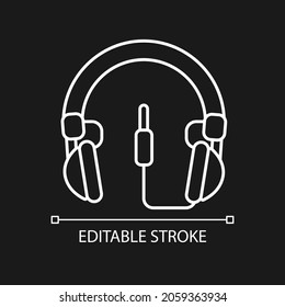 Wired circumaural headset white linear icon for dark theme. Over ear headset for gaming. Thin line customizable illustration. Isolated vector contour symbol for night mode. Editable stroke