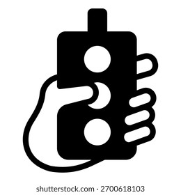 Wired remote with buttons in hand solid icon, manufacturing concept, factory control process sign on white background, glyph style icon for mobile and web design. Vector graphics