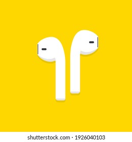 Wireless headphones on yellow background.