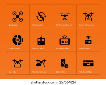 Wireless quadcopter and drone icons on orange background. Vector illustration.