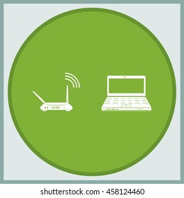 Wireless router connected to laptop.