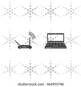 Wireless router connected to laptop.