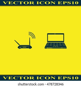 Wireless router connected to laptop.