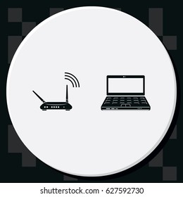 Wireless router connected to laptop.