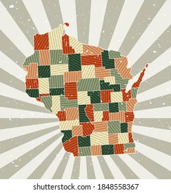 Wisconsin vintage map. Grunge poster with map of the us state in retro color palette. Shape of Wisconsin with sunburst rays background. Vector illustration.