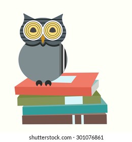 Wise owl on stack of books 