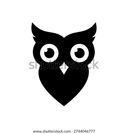 Wise owl silhouette icon. Black and white vector image of a wise owl with large, round eyes. The image represents knowledge, wisdom, and