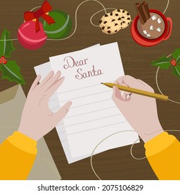 Wish list. Human Writes Letter to Santa Claus. The concept of Ecological. Natural New Year, Christmas