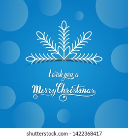 I wish you a Merry Christmas banner with snowflake and blue bokeh background. Lettering greeting card.