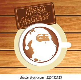 Wishing you a Merry Christmas. Coffee with cream and chocolate.