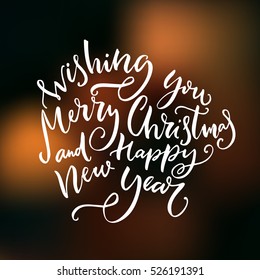 Wishing you Merry Christmas and Happy new year text. Vector calligraphy.