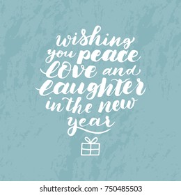 Wishing you peace, love and laughter in New year. Vector isolated white hand drawn text calligraphic. Design for card, print, poster. 