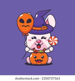 Witch bunny holding halloween balloon and candy. 