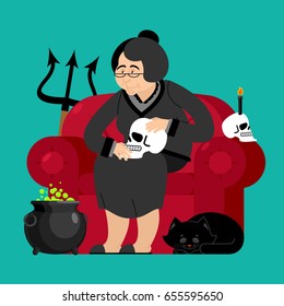 Witch in chair. Skull and black cat. Sorceress and Magic Pot Potion