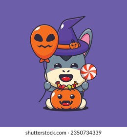 Witch donkey holding halloween balloon and candy.