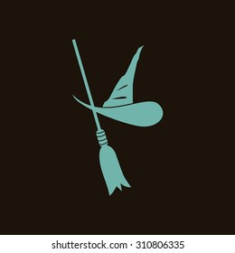 Witch hat and broom icon