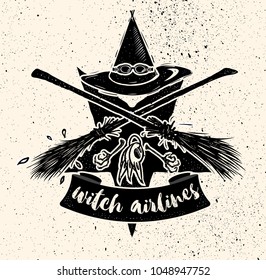 Witch hat with gogles and two crossed broomsticks. Logo emblem or t-shirt print
