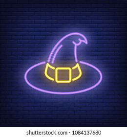 Witch hat neon sign. Purple witch hat with yellow belt. Night bright advertisement. Vector illustration in neon style for Halloween dress and holiday