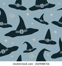 Witch hat and pixie dust Halloween seamless pattern. Wrapping paper vector illustration. Blue background.