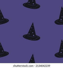 Witch hats vector seamless pattern. Halloween season caps on purple background for textile, fabric, wrapping paper design