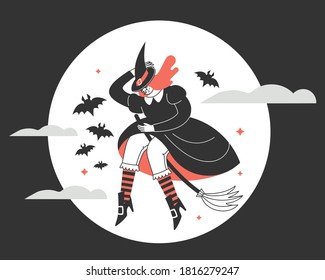 A witch on a broom against the background of the full moon.