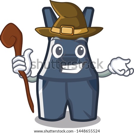 Witch overalls hanging on a cartoon wall