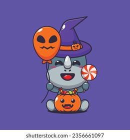 Witch rhino holding halloween balloon and candy. Cute halloween cartoon illustration. 