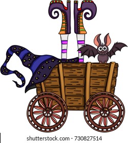 Witch upside down in a wooden trolley