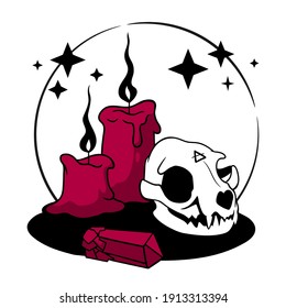 witchcraft composition of magical items - candles, animal skull and quartz crystal