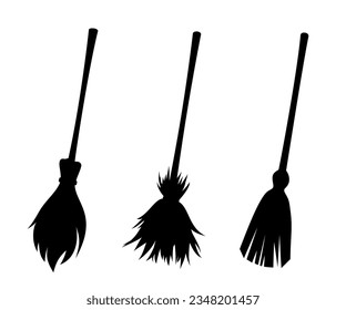 Witches brooms. Set of black silhouettes of brooms isolated on a white background. Vector illustration