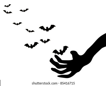 Witches hand with black bats