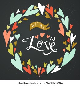 'With Love' hand lettering on sweet Valentine's card. Stylish romantic invitation card template with frame made of colorful doodle hearts on chalkboard background.