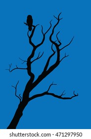 withered tree with owl on night background