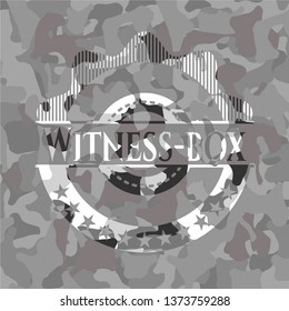 Witness-box on grey camouflaged pattern