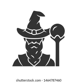 Wizard glyph icon. Silhouette symbol. Sorcerer, magician in hat. Old wise man, fantasy druid. Fairytale warlock with beard. Halloween costume. Negative space. Vector isolated illustration