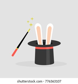 A wizard set: black hat with the rabbit ears inside and a magic wand. Flat editable vector illustration, clip art