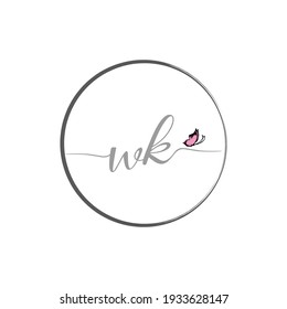 WK initial letter handwriting logo design with butterfly