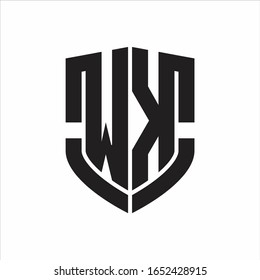 Monograma del logotipo WK con diseño de forma de escudo de emblema aislado sobre fondo blanco