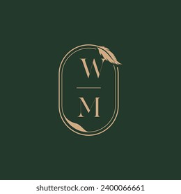 WM concepto de plumas nupcias monograma diseño del logo como inspiración