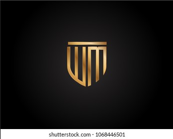 WM shield shape Letter Design in gold color