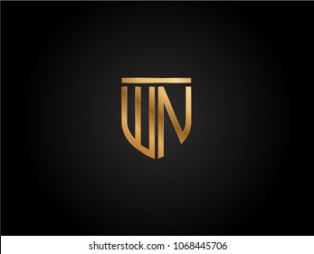 WN shield shape Letter Design in gold color