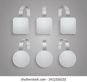 Wobbler template.  Set of bended white blank wobblers round and square shapes. 