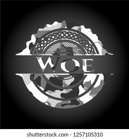 Woe on grey camo texture
